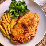 Frango à Parmegiana sem Fritura casquinha crocante e frango suculento com leveza e sabor