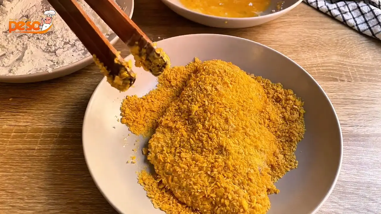 Frango à Parmegiana sem Fritura casquinha crocante e frango suculento com leveza e sabor